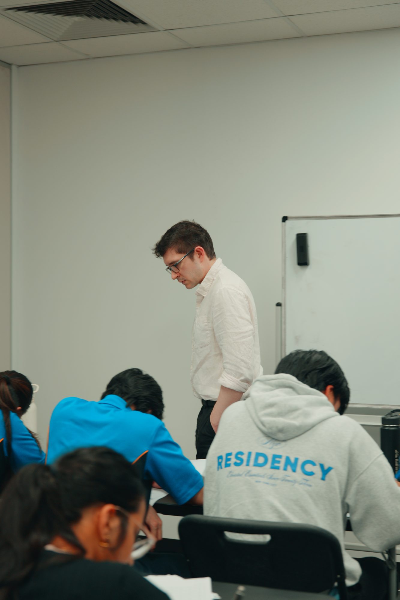A Spartan Tuition tutor leading a group class at the Mount Waverley office