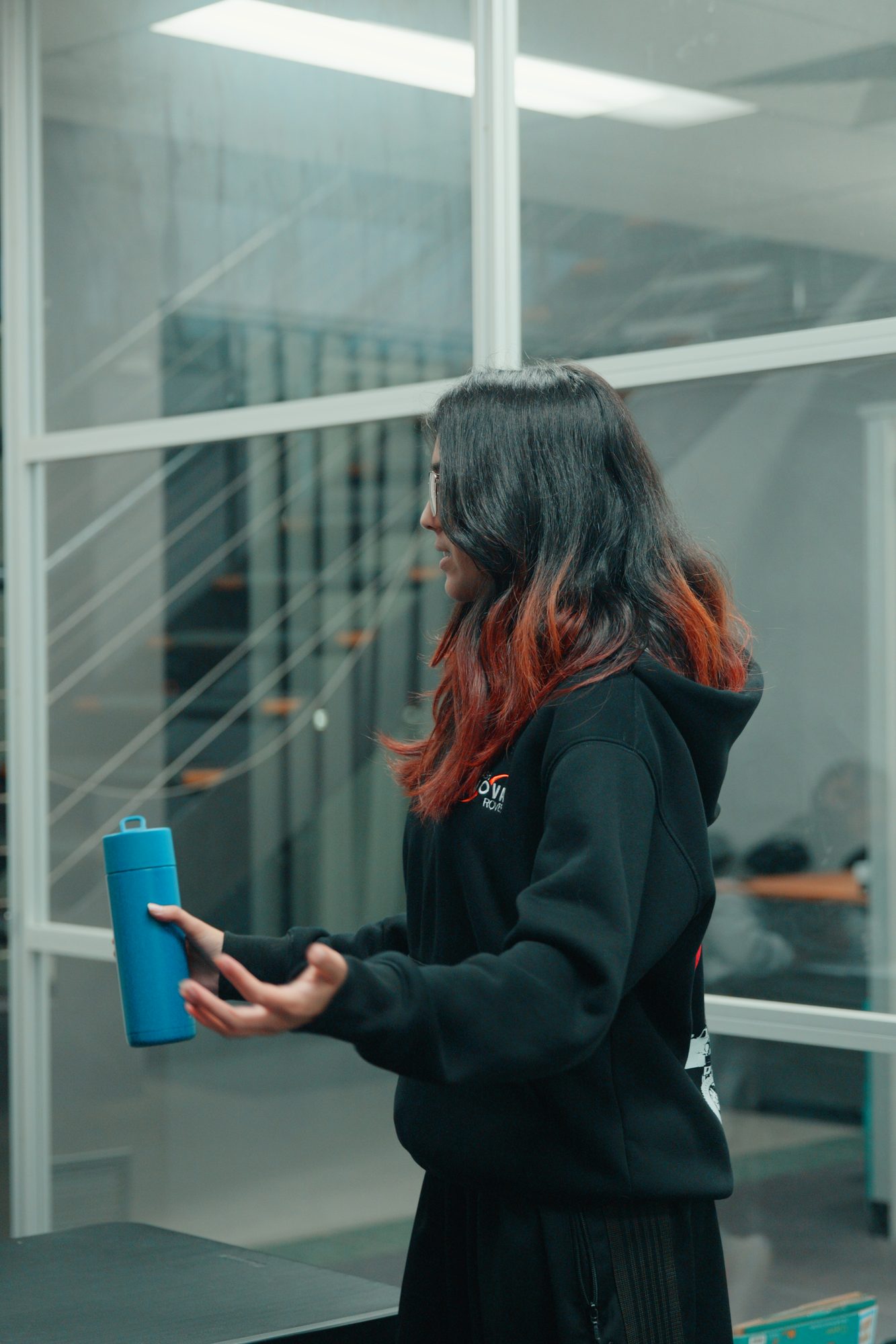 A Spartan Tuition tutor explaining a concept during a group class