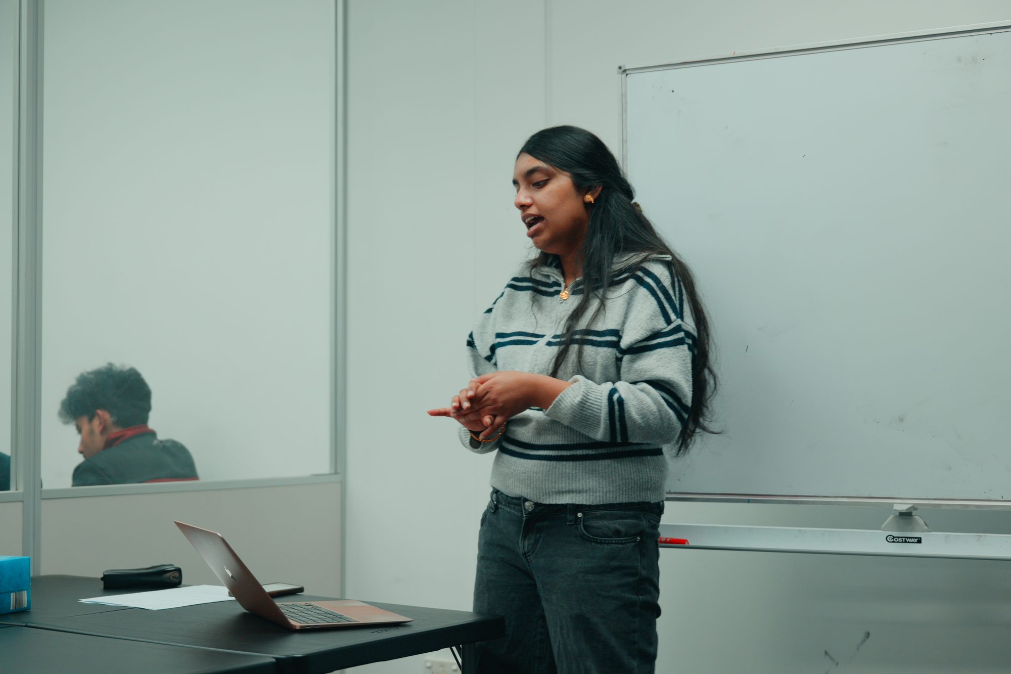 A Spartan Tuition tutor presenting to a class